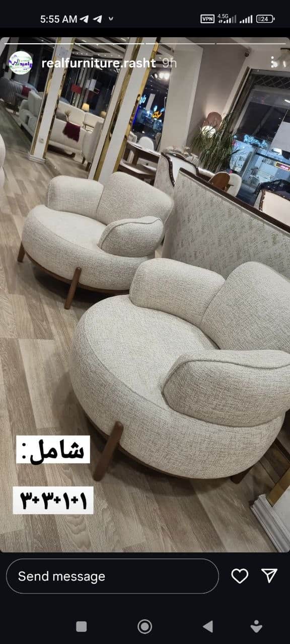 A modern, rounded accent chair upholstered in a light, neutral-toned fabric, featuring a continuous… — free OBJ 3D model