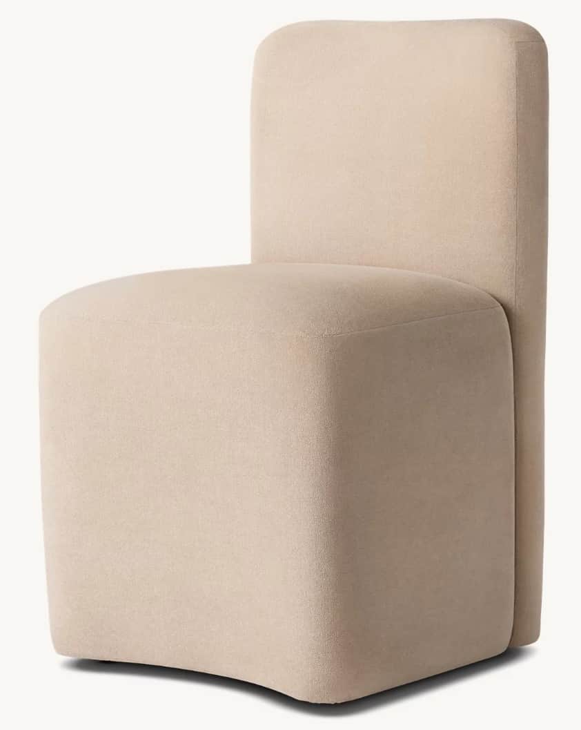 A contemporary upholstered chair with a clean, minimalist design. The chair features a squared-off s… — free GLTF 3D model