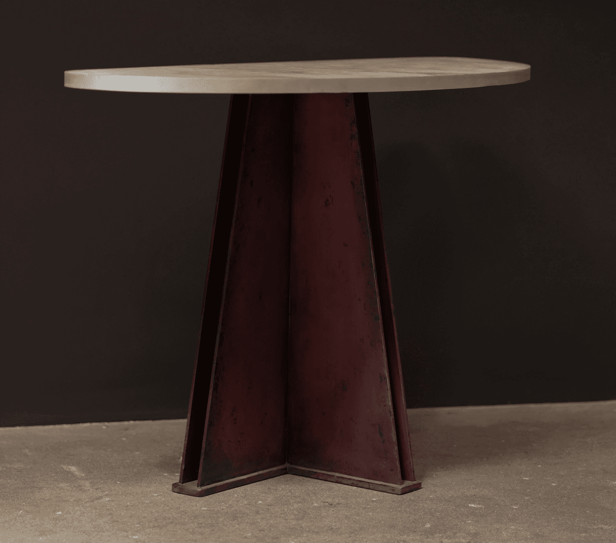 A contemporary console table featuring a grey concrete half-moon shaped top and a sculptural, angula… — 3D model