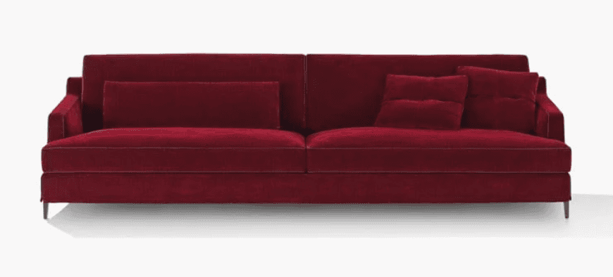 A contemporary three-seater sofa upholstered in a deep red, possibly velvet or a similar plush fabri… — 3D model