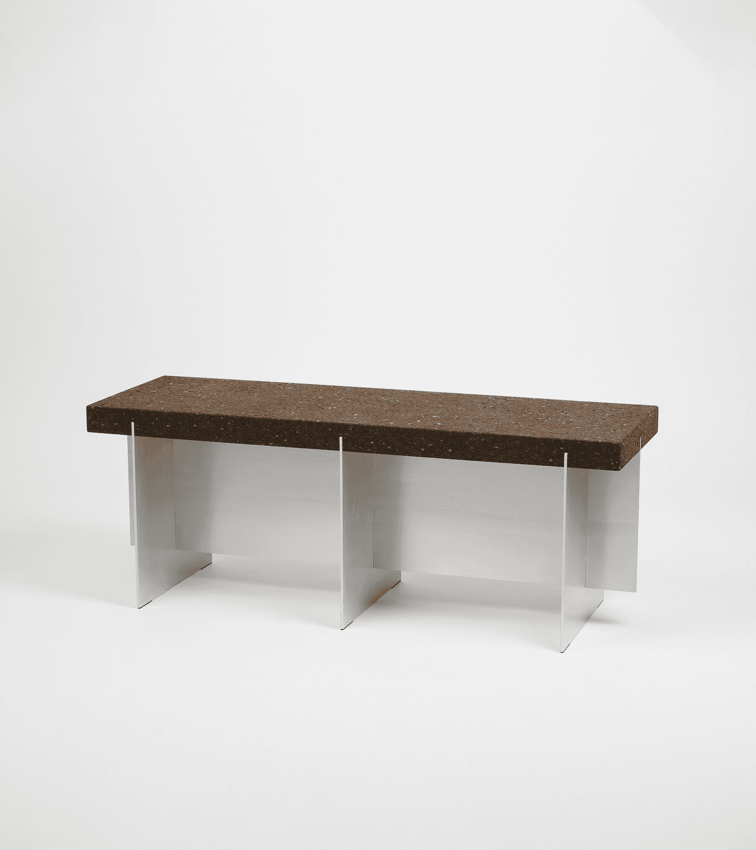 A rectangular bench with a textured, dark brown top and a sleek, silver-toned base. The top appears… — 3D model