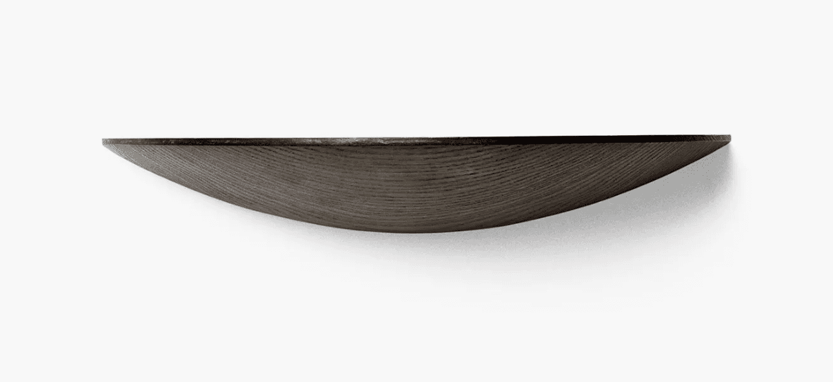 A dark-stained wood floating wall shelf featuring a distinctive concave or bowl-like profile. The vi… — 3D model