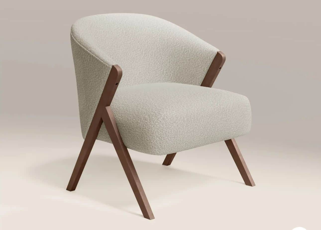 A contemporary upholstered armchair featuring a rounded backrest and seat, fully covered in a light,… — free OBJ 3D model
