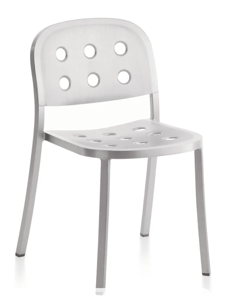 A modern chair with a brushed aluminum finish. It features a curved backrest and seat, both perforat… — 3D model