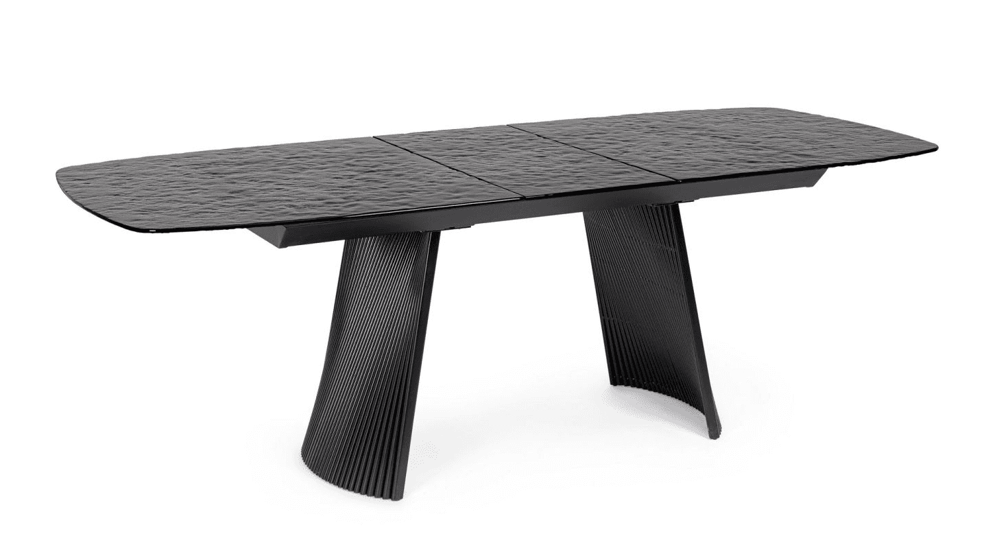 A contemporary dining table with a textured, dark surface and a black, ribbed pedestal base. The tab… — 3D model