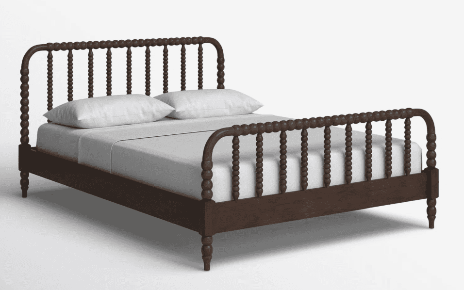 A dark brown wooden bed frame with a headboard and footboard featuring turned spindles and decorativ… — free BLEND 3D model