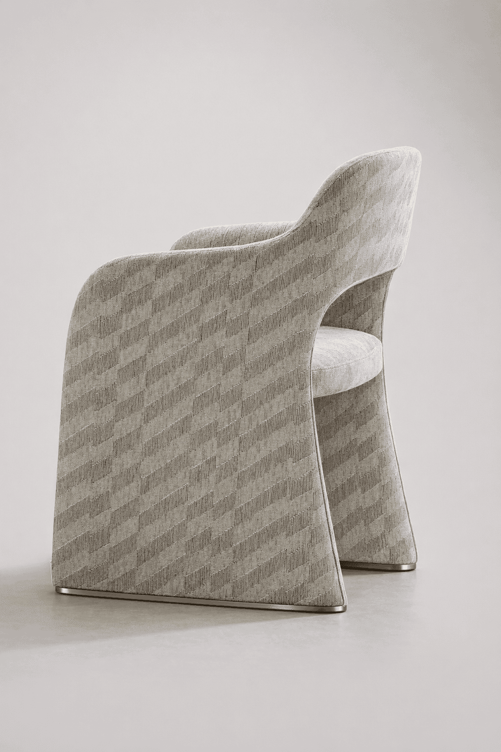 An armchair with a distinctive, sculptural design. The piece features a fully upholstered body with… — free OBJ 3D model