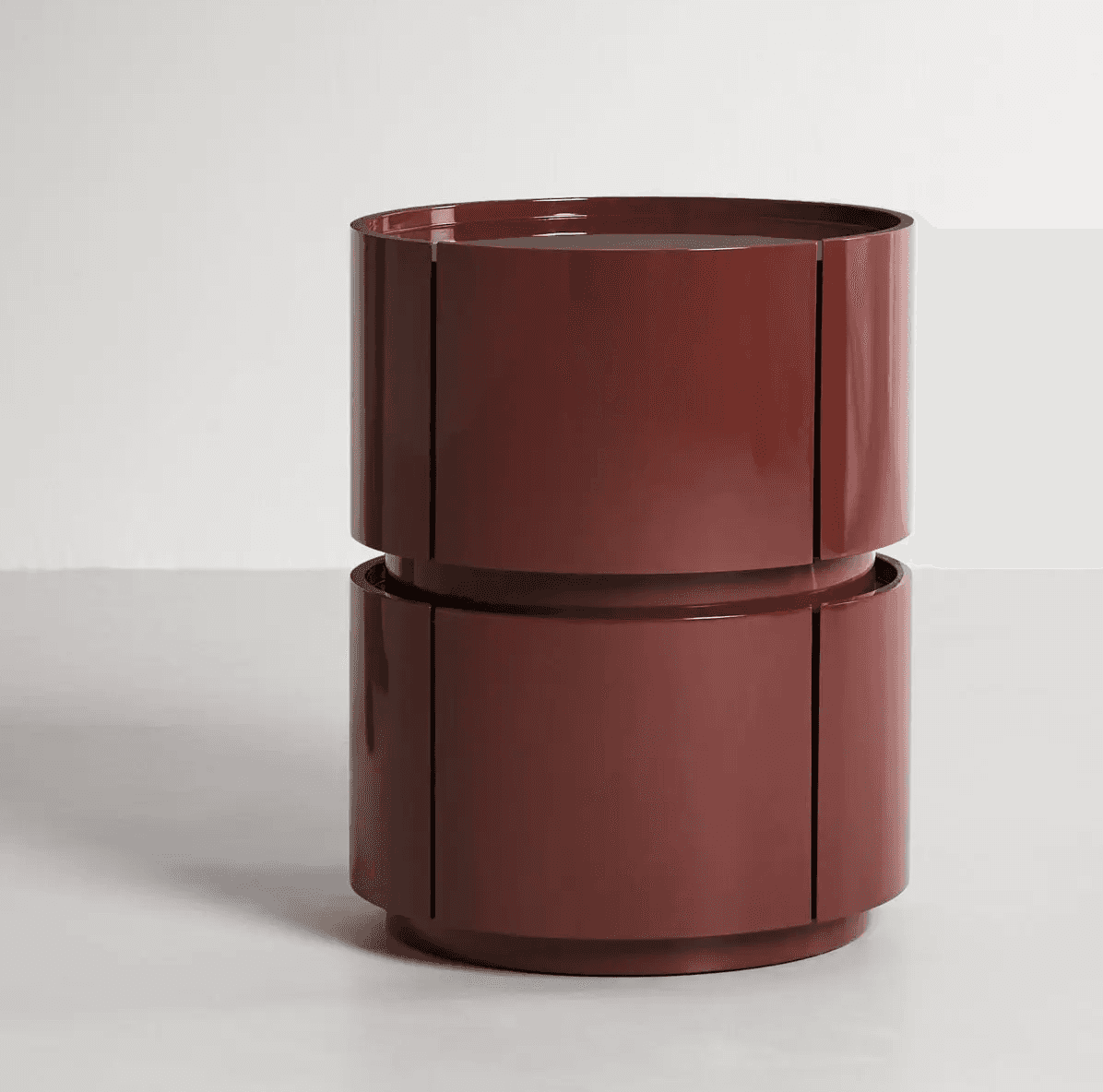 A dark red, high-gloss lacquered cylindrical table composed of two stacked tiers. Each tier features… — free STL 3D model