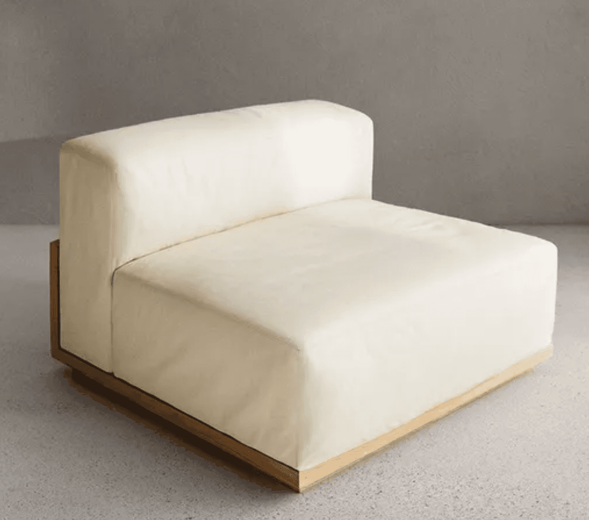 An armless modular seating unit upholstered in a light cream or off-white fabric, designed to integr… — 3D model