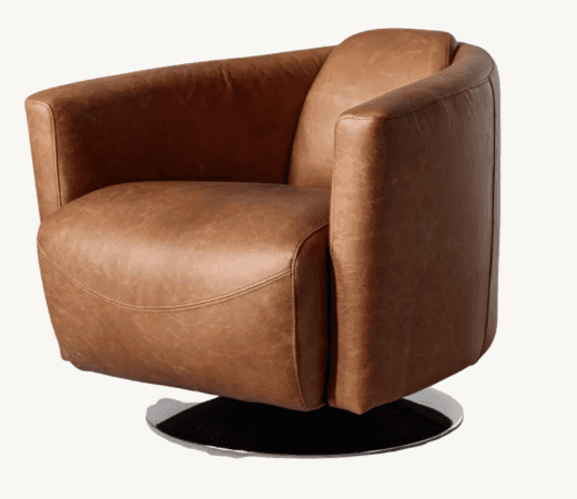 A contemporary swivel lounge chair upholstered in tan leather, featuring a rounded, integrated desig… — 3D model