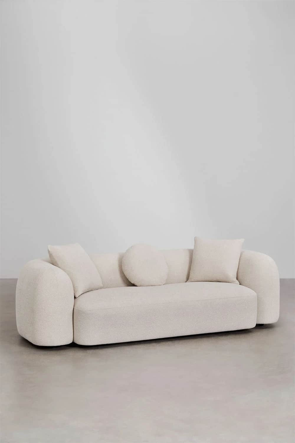 A plush, generously proportioned sofa with a rounded, organic form. It features deep seating and sub… — free OBJ 3D model