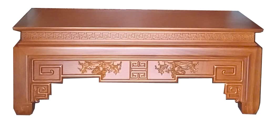 A low-profile wooden table featuring elaborate traditional Chinese carvings. The table has a rectang… — 3D model
