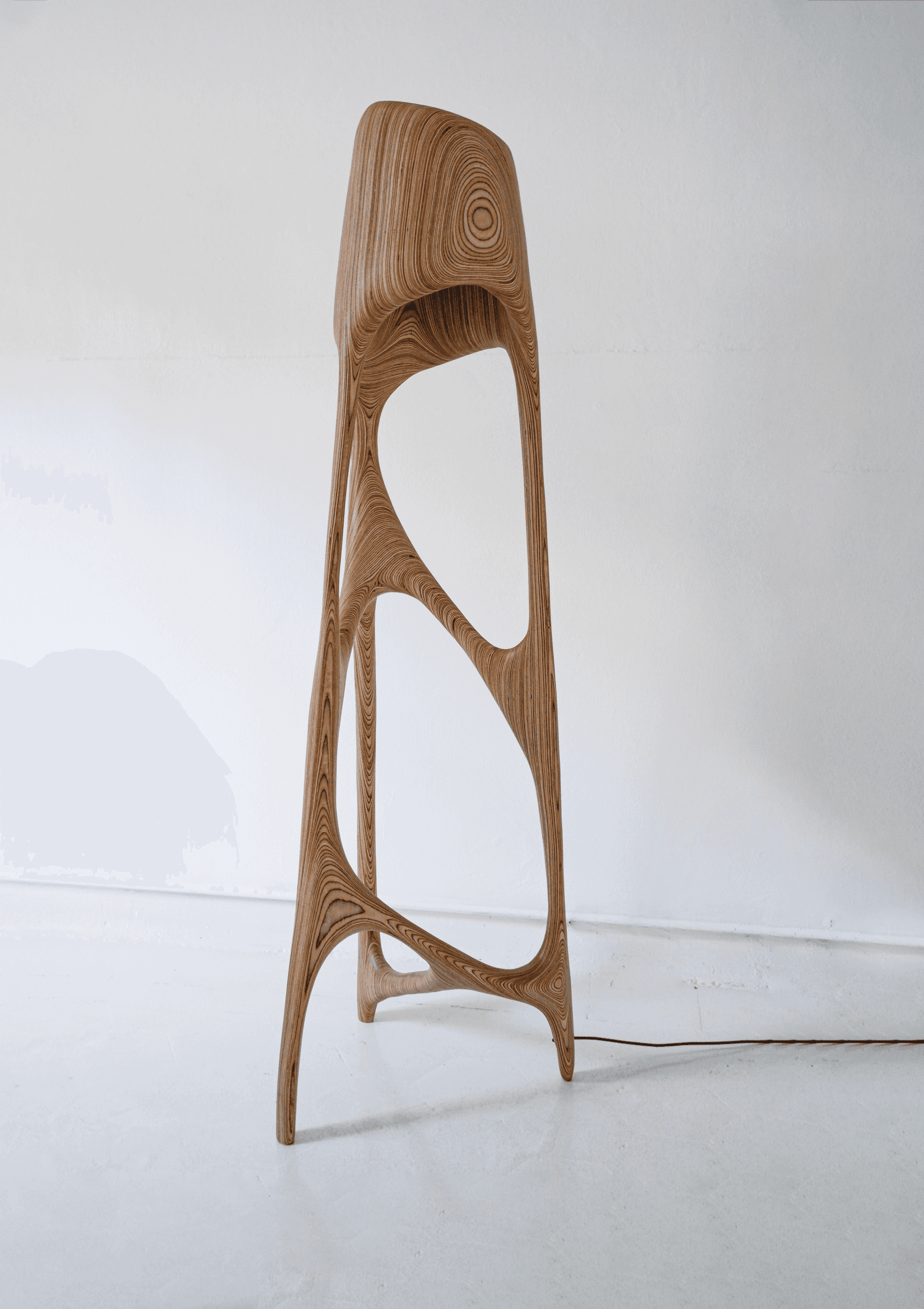 A contemporary bar stool with an organic, sculpted form. The stool features a high back and appears… — free BLEND 3D model