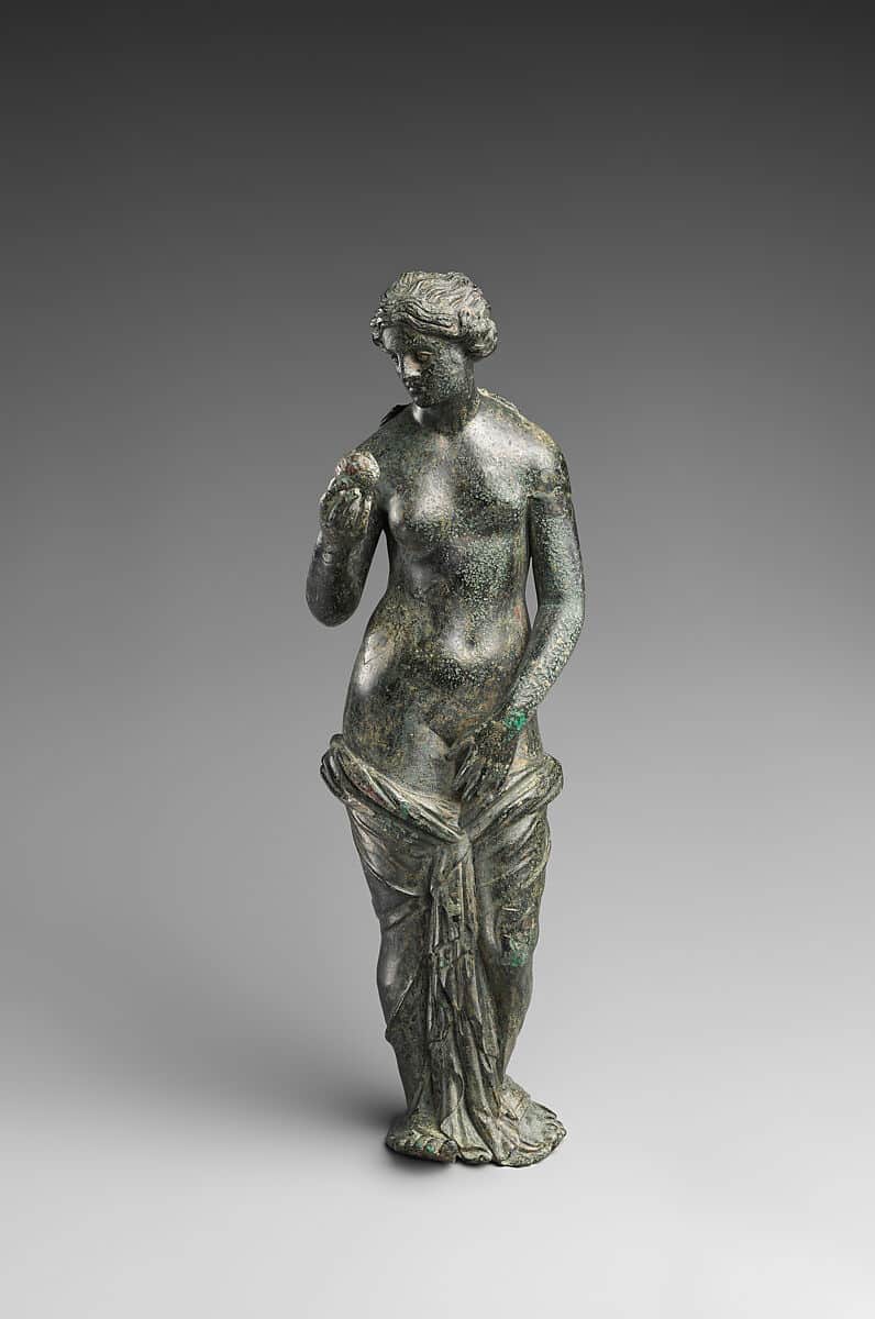 A standing classical bronze figurine depicting a female nude figure, likely Venus, with drapery artf… — 3D model