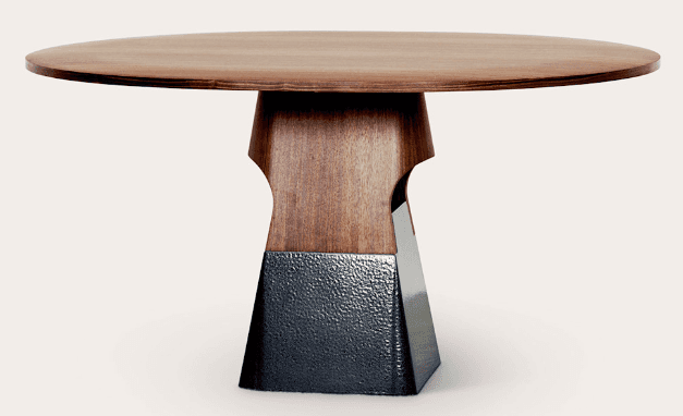 A round-topped dining table with a distinctive pedestal base. The tabletop is made of wood with a vi… — 3D model