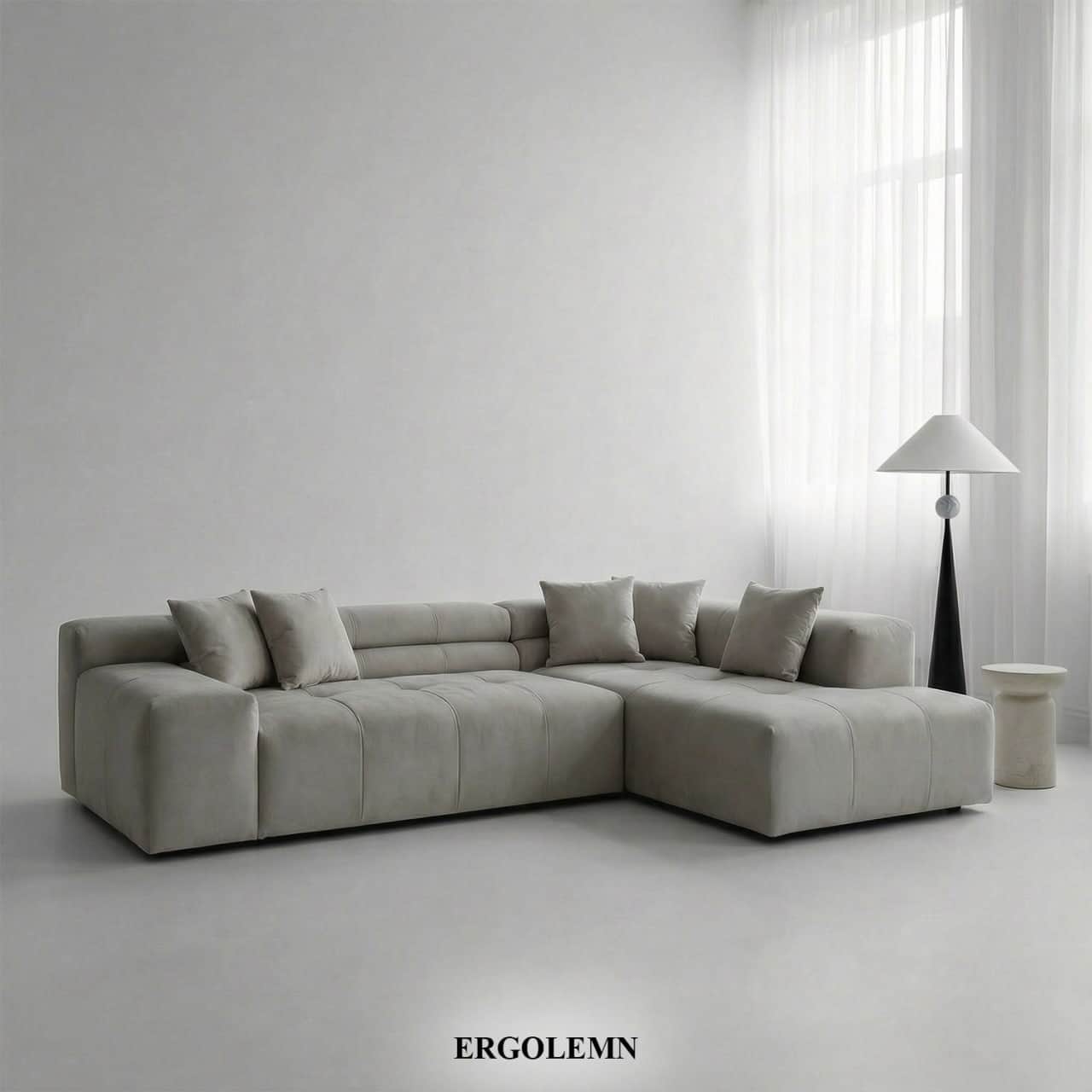 A light gray modular L-shaped sectional sofa with deep button tufting and loose back cushions, featu… — 3D model