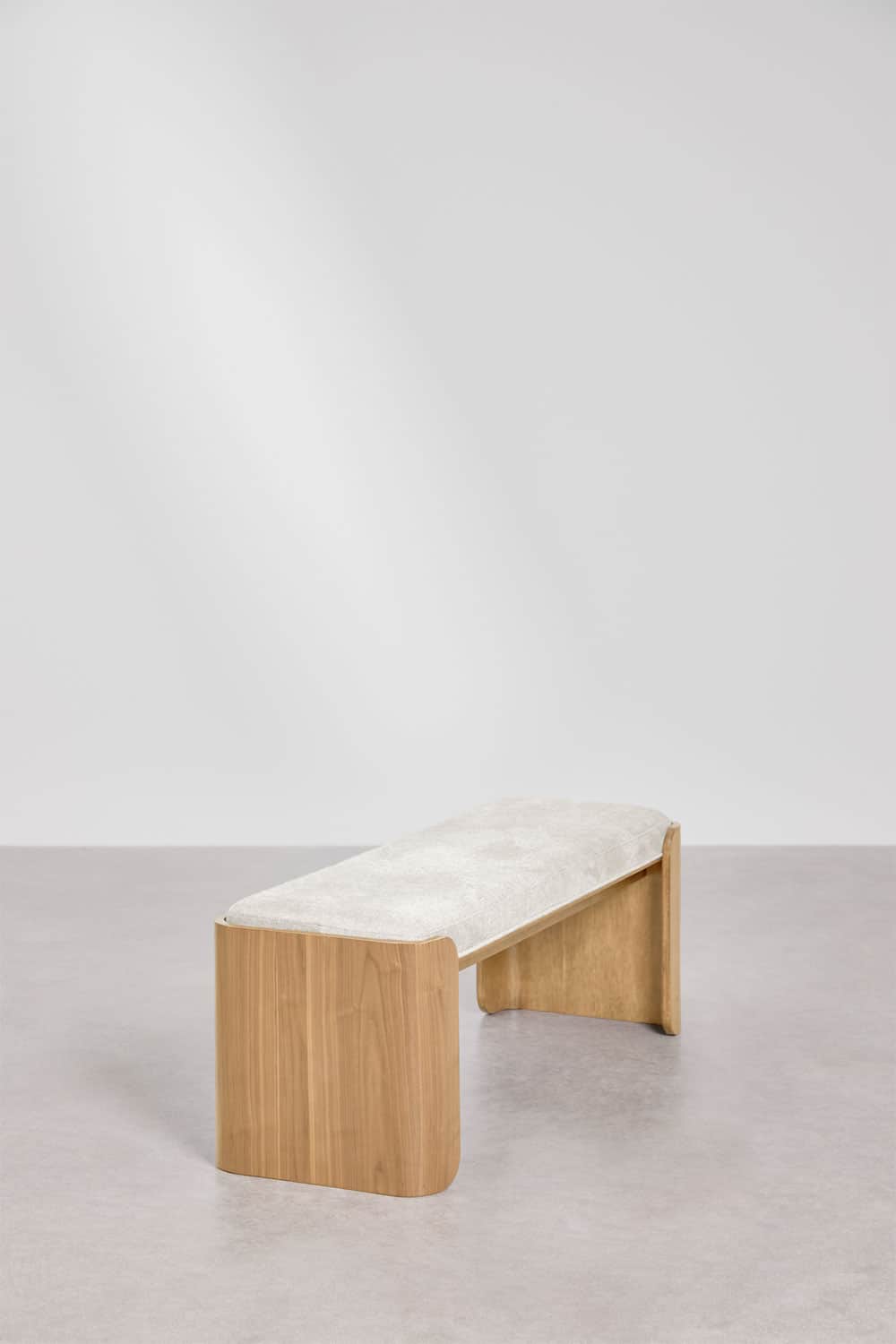 A modern bench featuring a light-colored upholstered seat and a natural wood base with a distinctive… — 3D model
