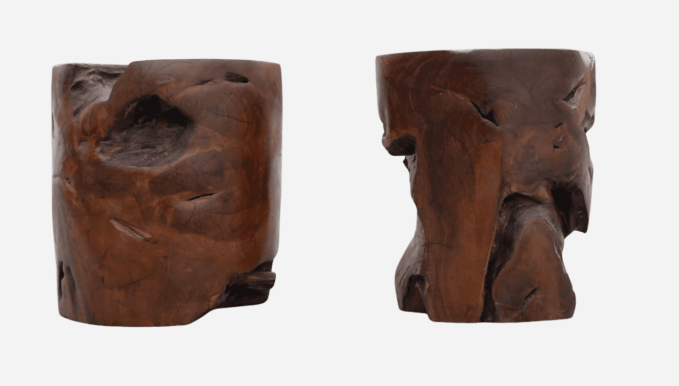 A solid, cylindrical pedestal crafted from a single piece of natural teak wood. It features organic,… — free STL 3D model