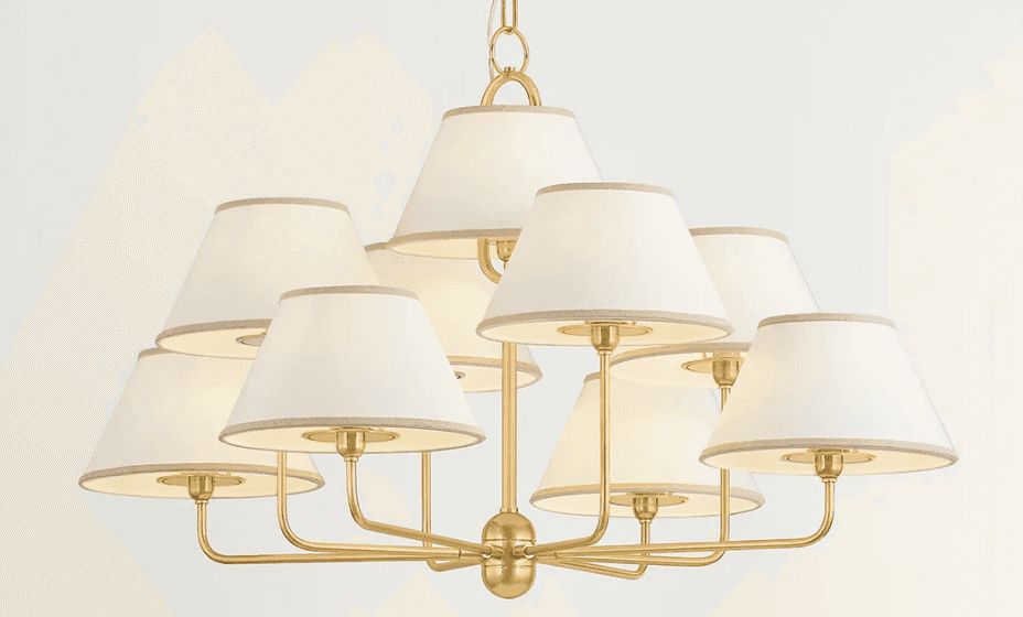 A contemporary or transitional chandelier featuring a satin brass finish and nine individual tapered… — 3D model