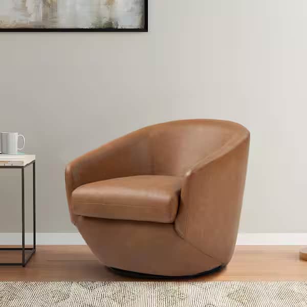 A modern barrel-back swivel armchair upholstered in tan or caramel-colored leather, featuring a low… — 3D model