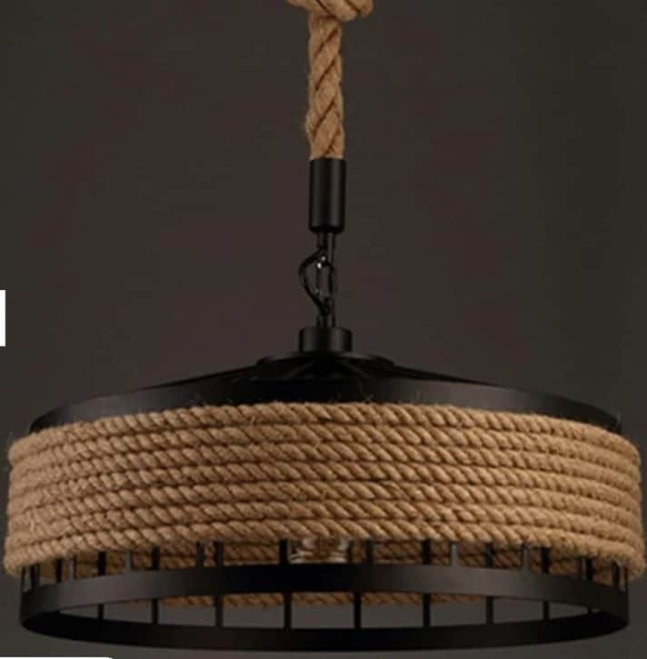 A black metal and rope pendant light featuring a drum-shaped shade. The light is suspended by a thic… — 3D model