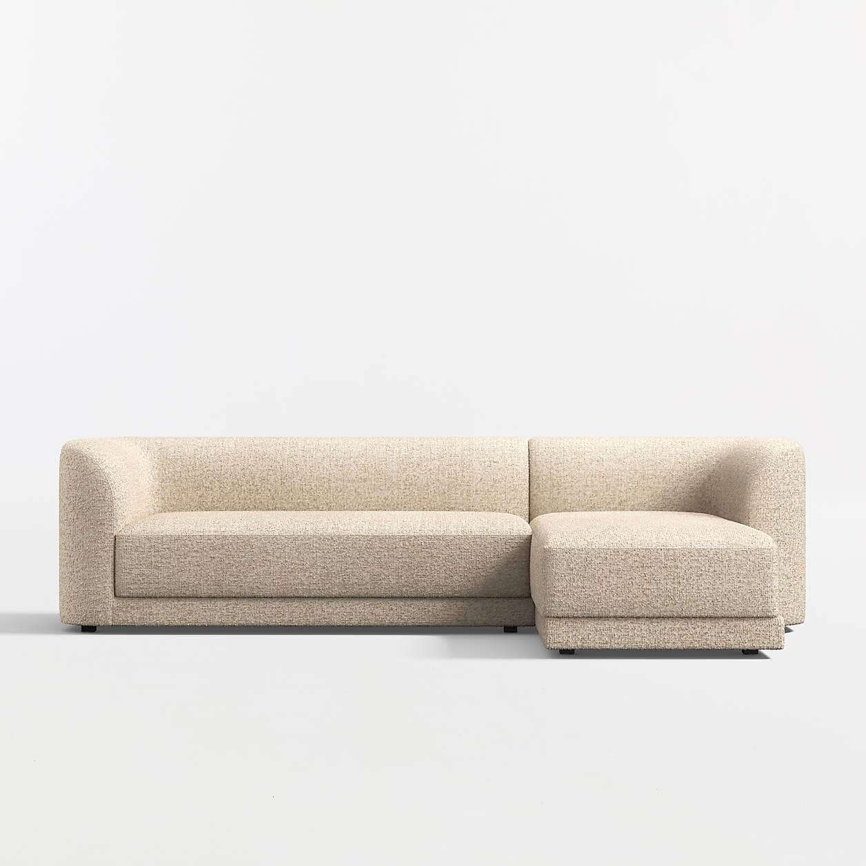 A sectional sofa with a chaise lounge attachment. The sofa features rounded armrests and a low profi… — 3D model