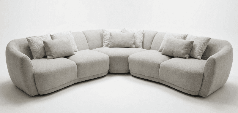 A large, modern modular sectional sofa upholstered in a light-colored, textured fabric. It features… — 3D model
