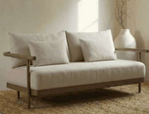 A contemporary two-seater sofa featuring a minimalist design with a visible wooden frame and light b… — 3D model