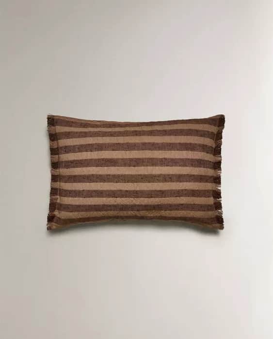 A rectangular pillow with a striped pattern. The stripes alternate between a lighter beige and a dar… — 3D model