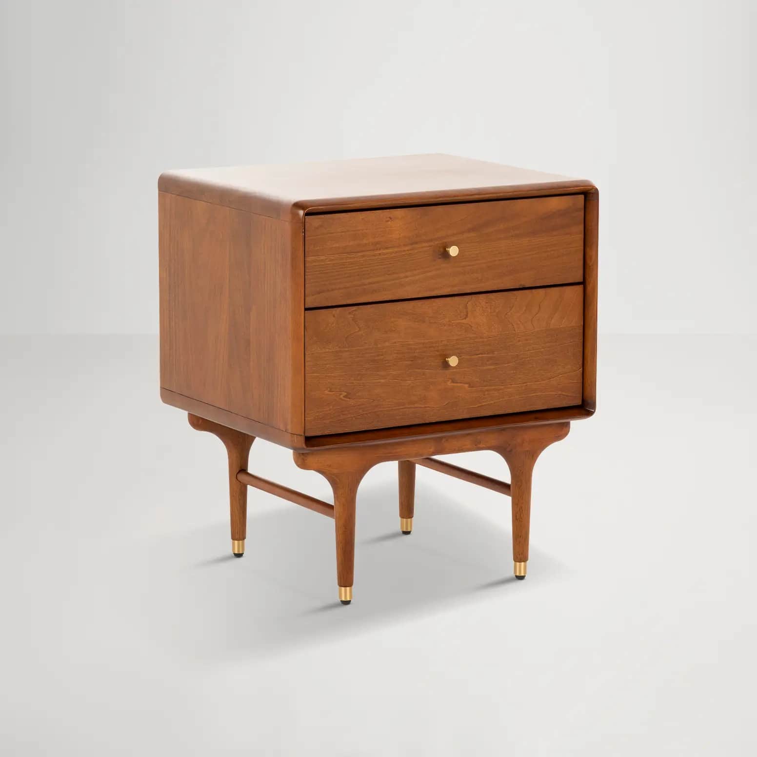 A mid-century modern style nightstand with a warm brown wood finish, featuring two drawers with circ… — 3D model