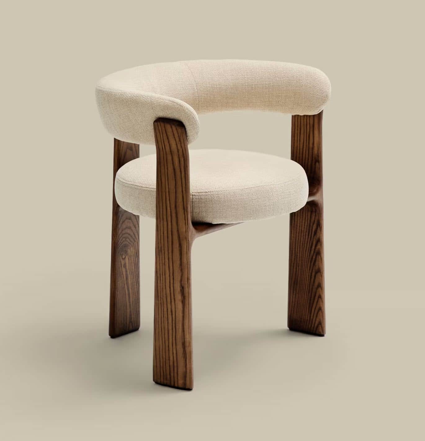 A modern armchair featuring a sculpted dark wood frame and cream-colored textile upholstery. The cha… — 3D model