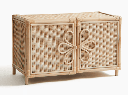 A small, rectangular accent cabinet constructed from woven natural rattan, featuring two front-openi… — 3D model