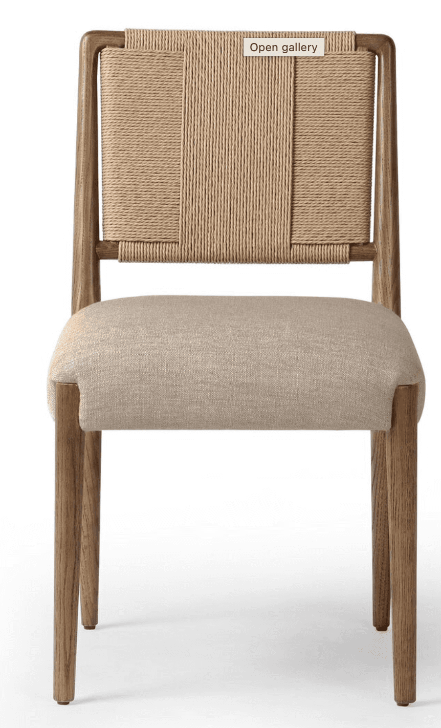 A contemporary dining chair featuring a solid wood frame, a natural woven rope backrest, and an upho… — 3D model