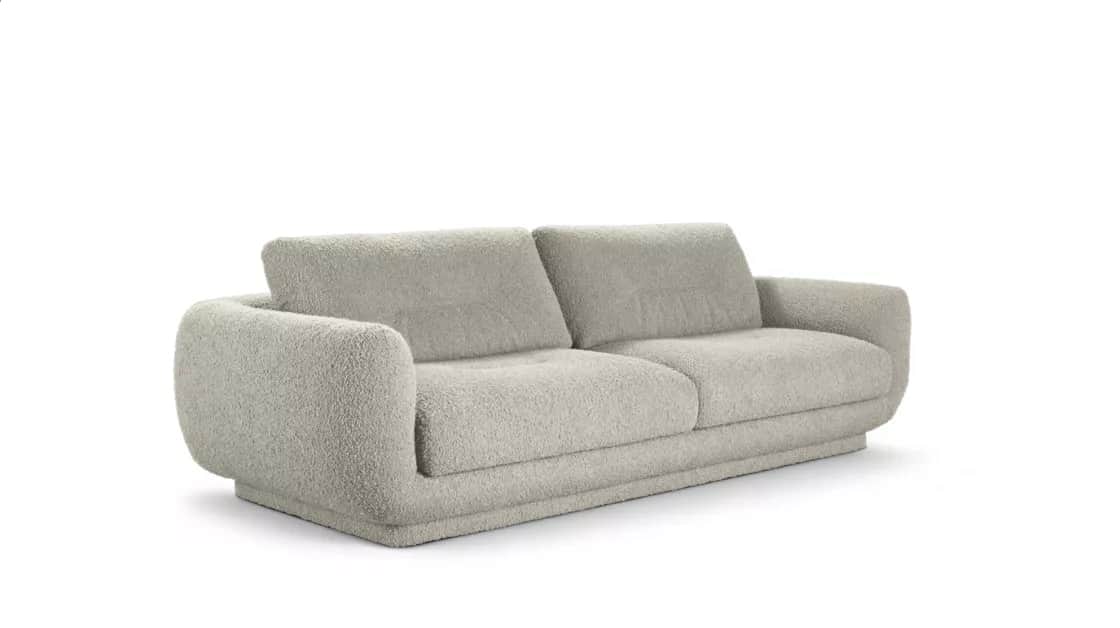 A two-seater sofa upholstered in a light-colored, textured boucle fabric, featuring a contemporary d… — free GLTF 3D model