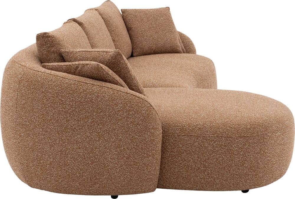 A modern, curved sectional sofa upholstered in a textured, light brown or tan boucle-style fabric. T… — free GLTF 3D model
