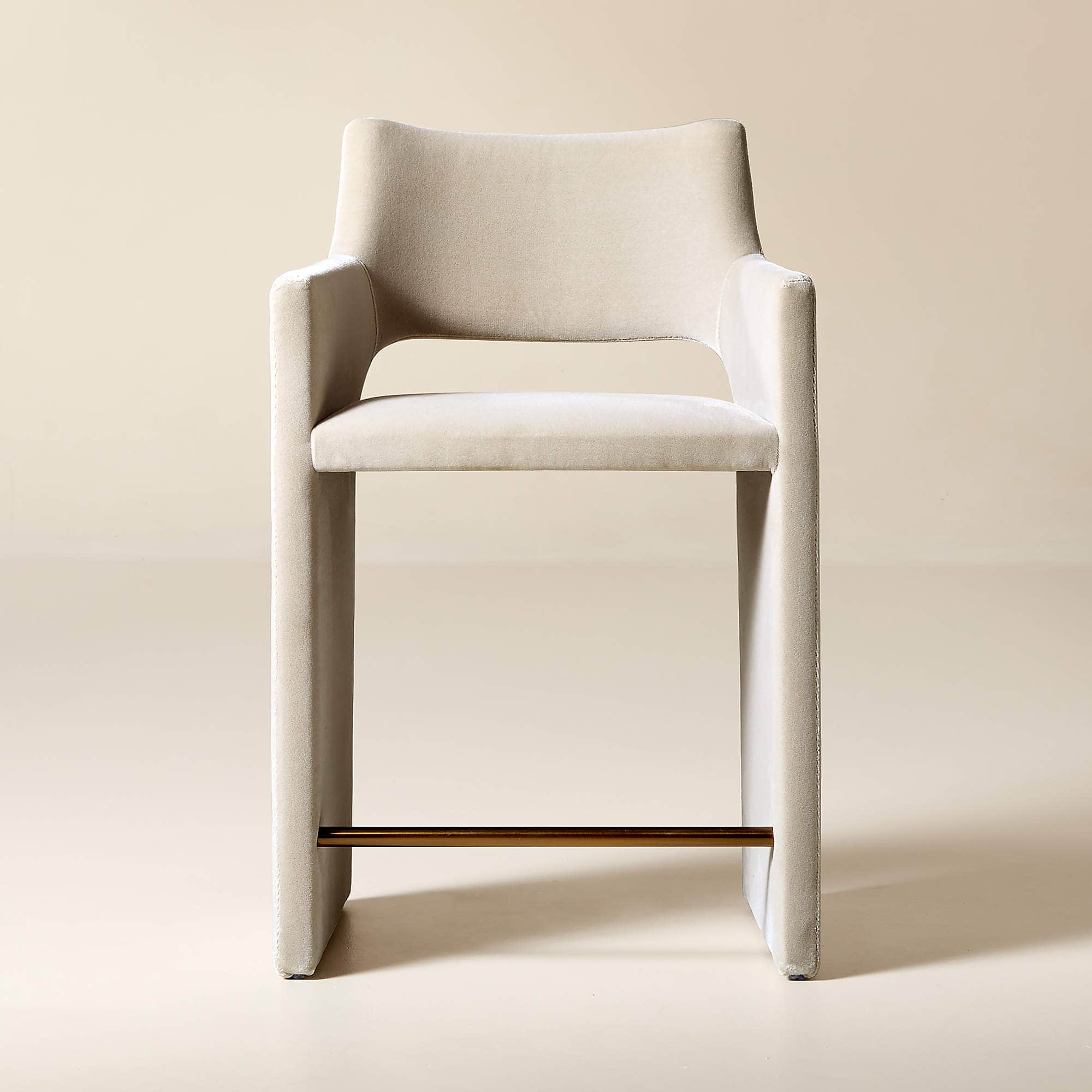 A contemporary bar stool with a sleek, minimalist design. It features a high back and armrests that… — free OBJ 3D model
