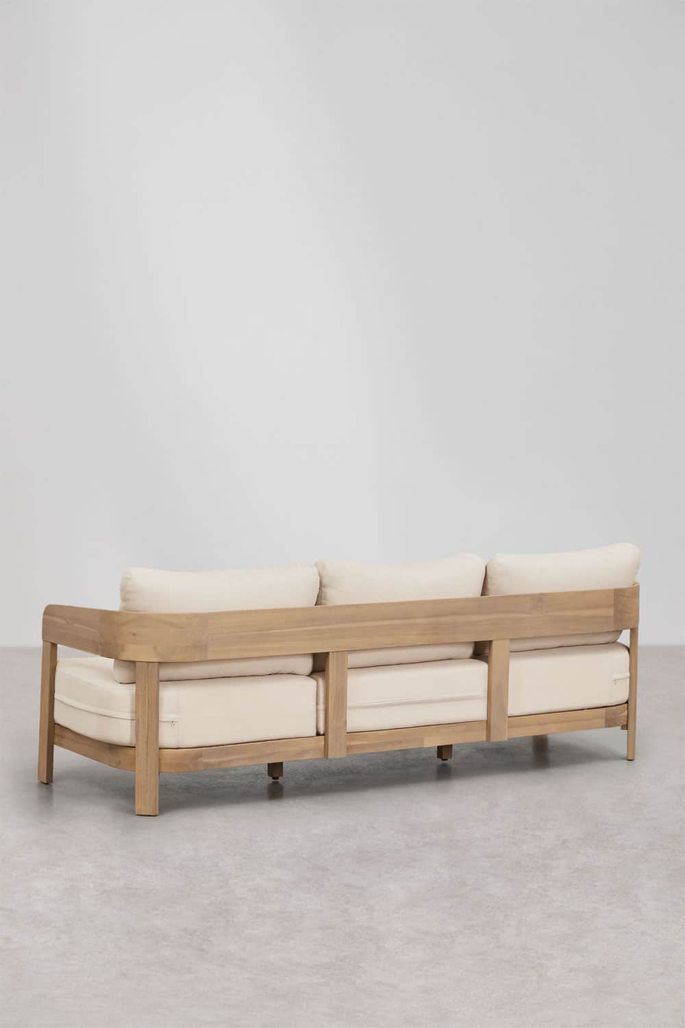 A three-seater sofa featuring a robust natural teak wood frame and three sets of light-colored, remo… — free GLTF 3D model