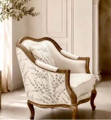 An elegant French Provincial style armchair featuring an exposed, dark stained wood frame with ornat… — 3D model
