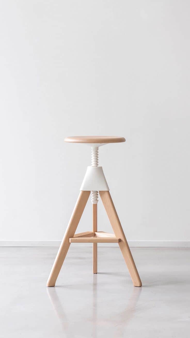 A modern bar stool with a natural wood seat and a tripod base constructed from wood. The height of t… — 3D model