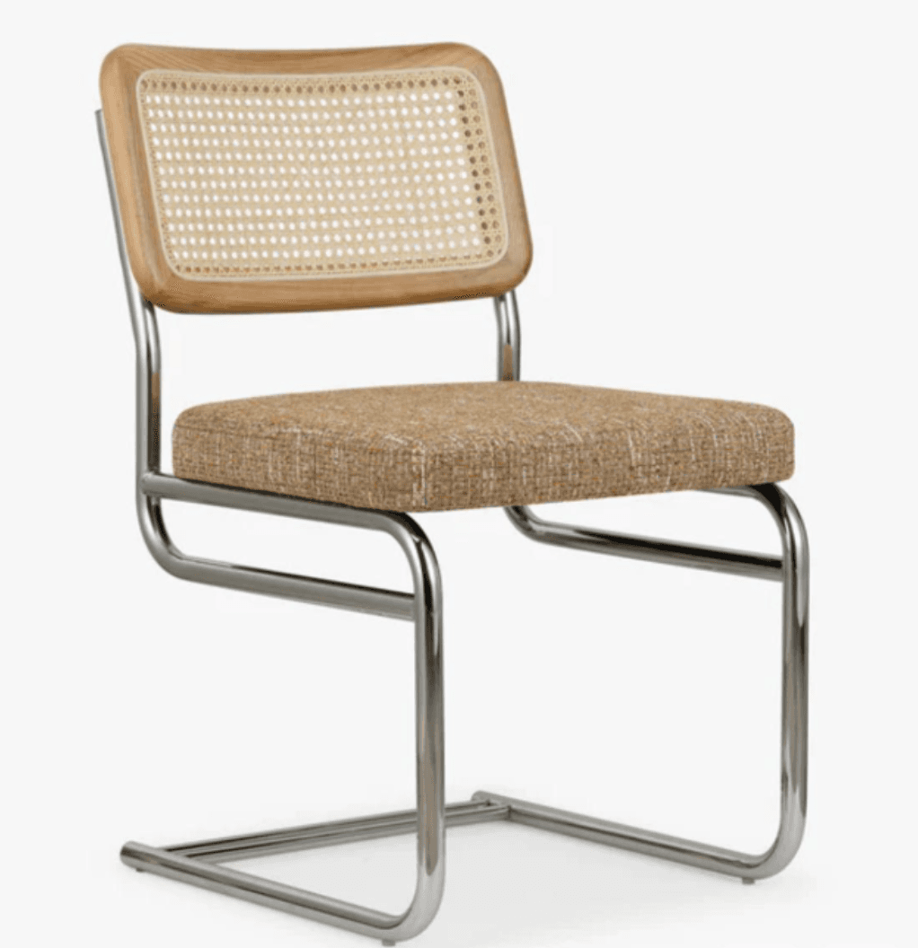 A cantilever chair featuring a tubular chrome-plated steel frame. The seat is upholstered in a textu… — 3D model