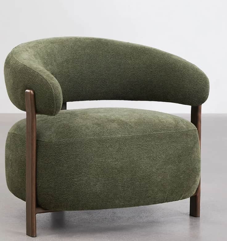 A modern lounge chair featuring a curved back and seat upholstered in olive green bouclé fabric, sup… — free OBJ 3D model