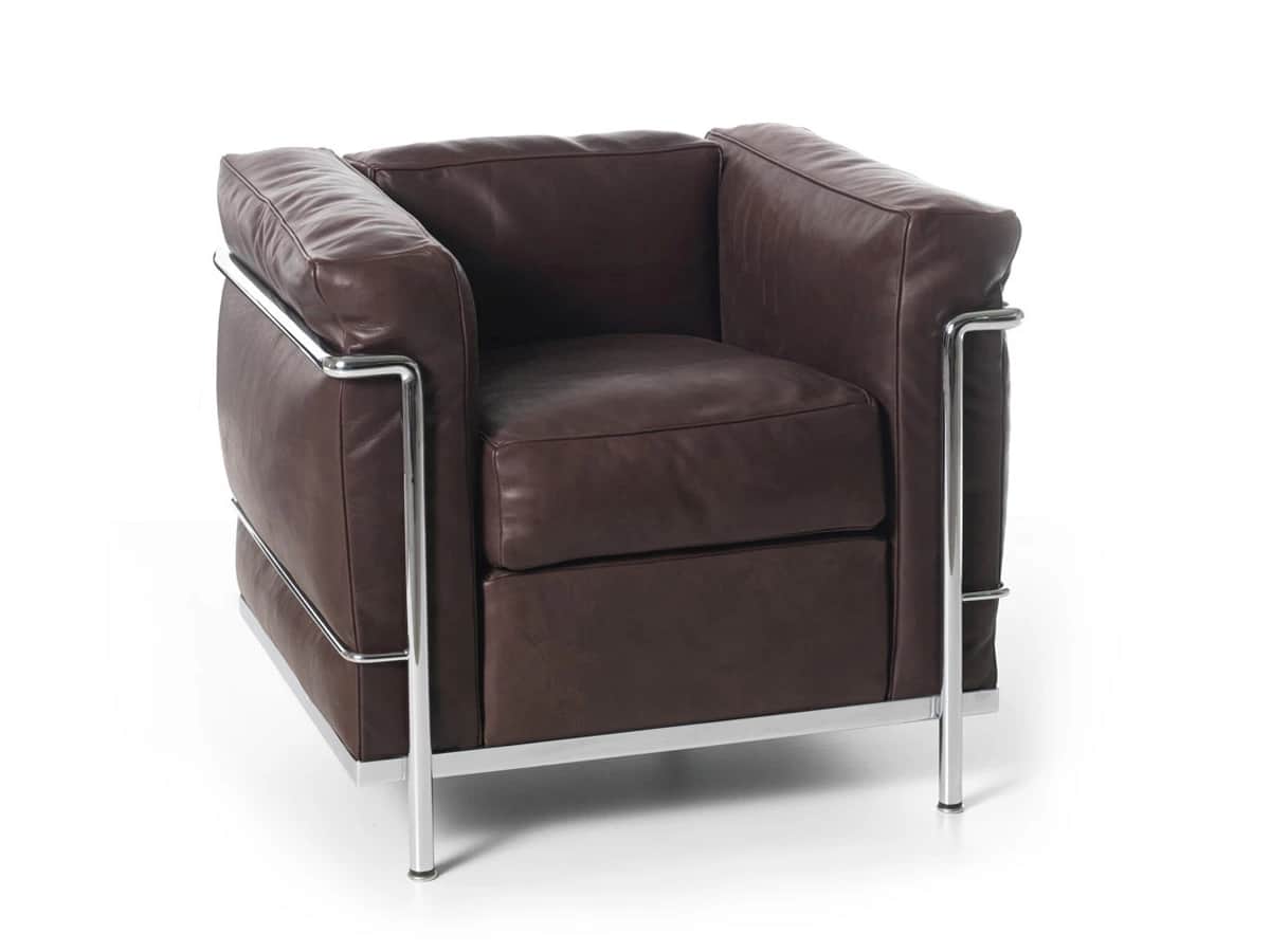 A modernist armchair featuring a visible, polished chrome-plated tubular steel frame and plush, dark… — free BLEND 3D model