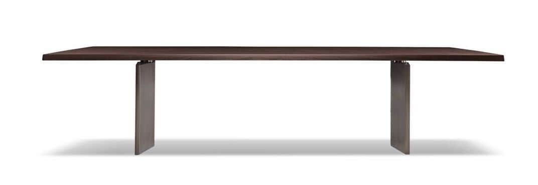 A modern, rectangular dining table featuring a dark wood top and two sturdy, dark metal slab legs. T… — free FBX 3D model