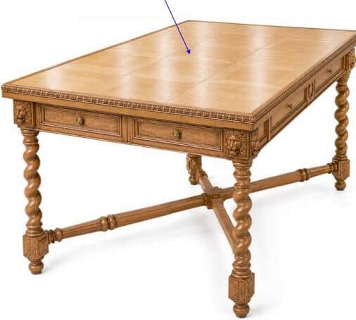 A large, elaborately carved wooden desk featuring barley twist legs, lion head carvings, and a parqu… — 3D model