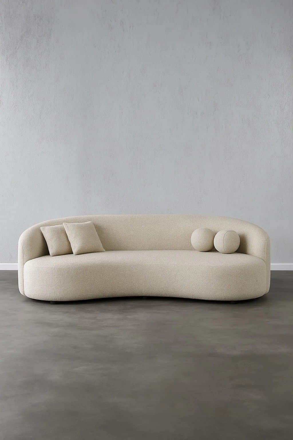 A cream-colored, curved sofa with a textured upholstery fabric. The sofa features a rounded armrest… — free GLTF 3D model