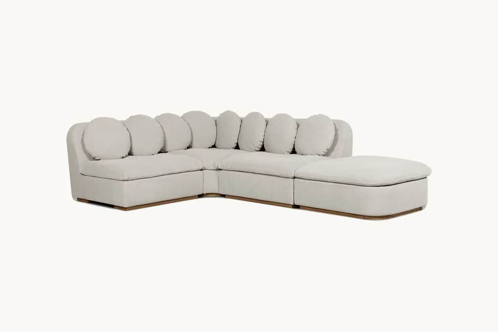 A modular sectional sofa with a chaise lounge. The sofa features a low profile with square seat cush… — 3D model