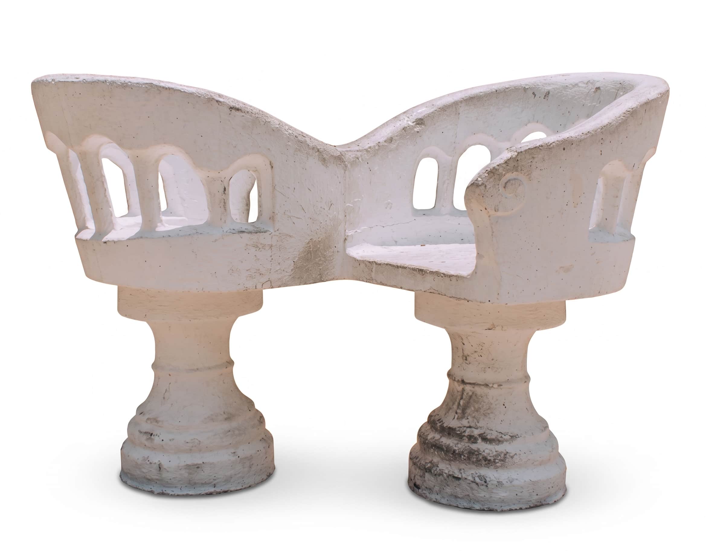A sculptural white concrete garden bench featuring two distinct seating sections supported by stout… — 3D model