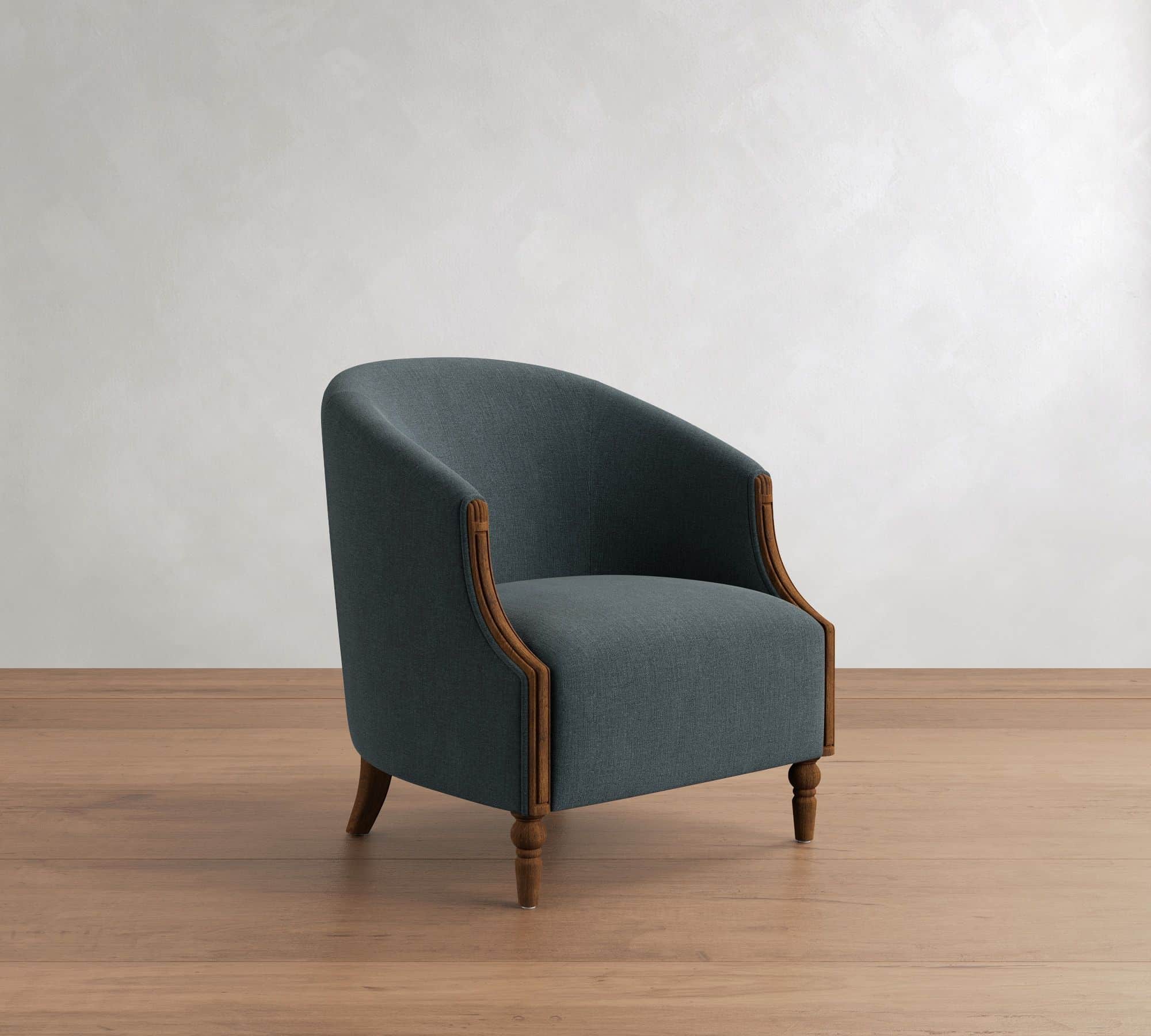 A blue-grey upholstered barrel-back accent chair with exposed dark wood trim and turned legs, featur… — free GLTF 3D model