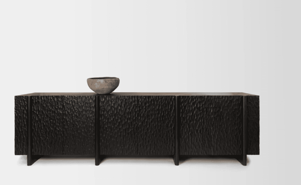 A dark-colored credenza with a textured front featuring multiple doors. The credenza has a rectangul… — 3D model