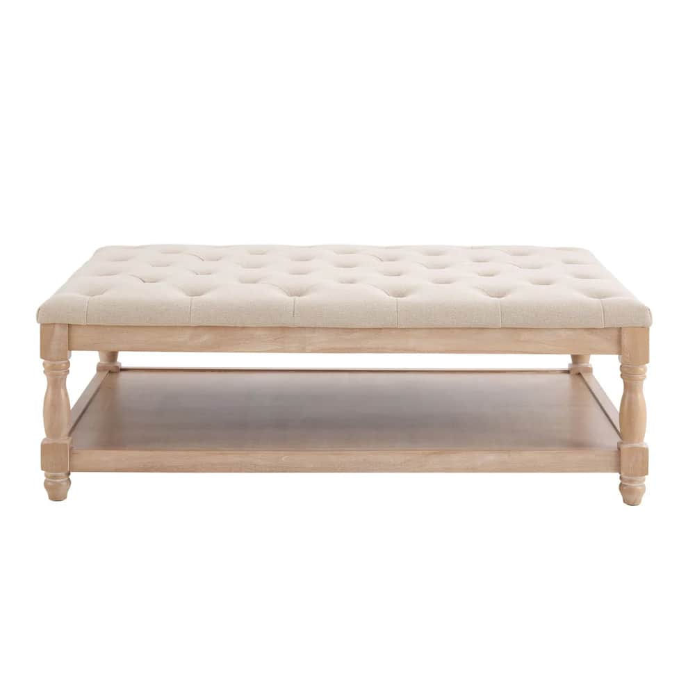 A rectangular coffee table with a tufted upholstered top and a lower wooden shelf. The table feature… — 3D model